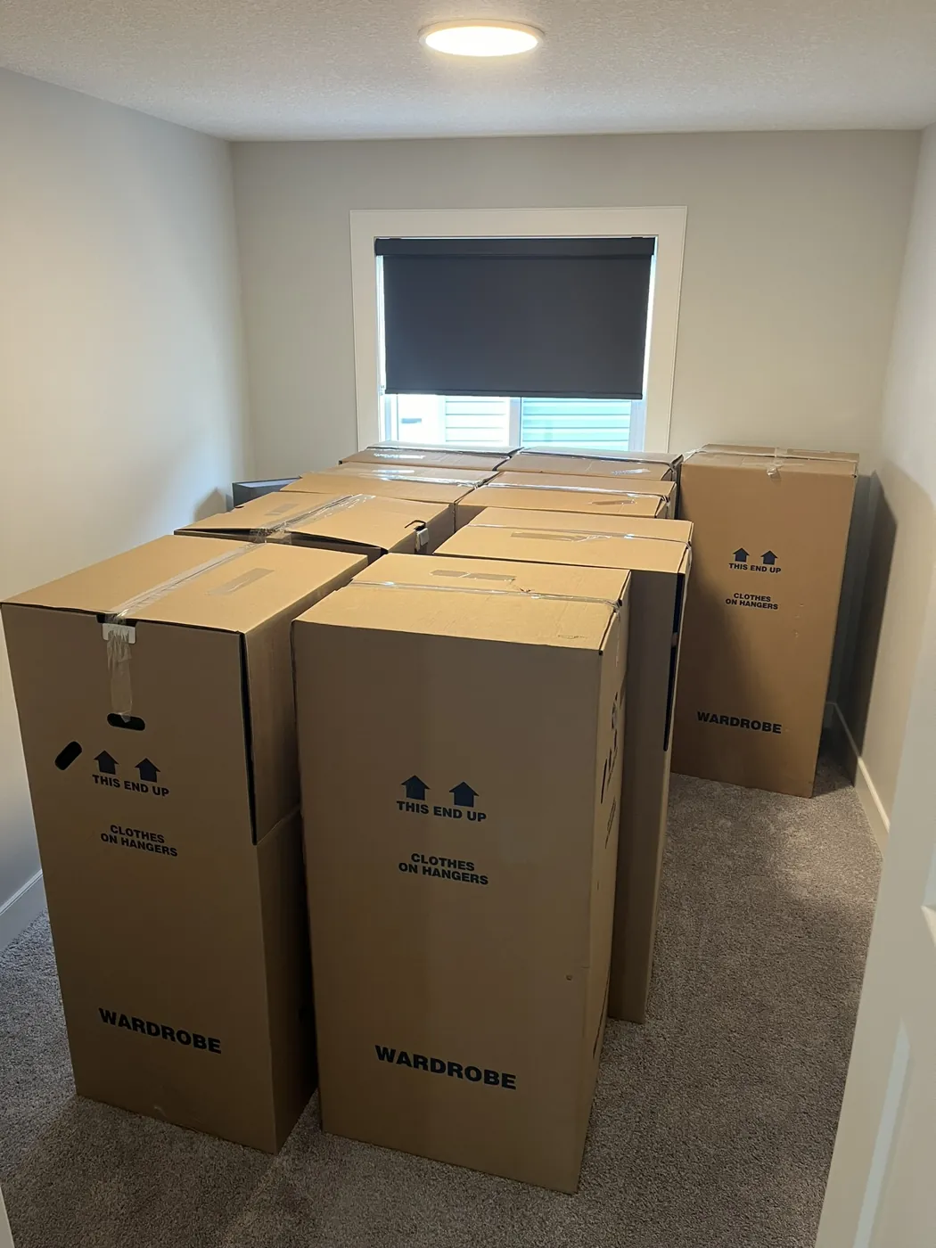 Moving boxes prepared and grouped inside a home
