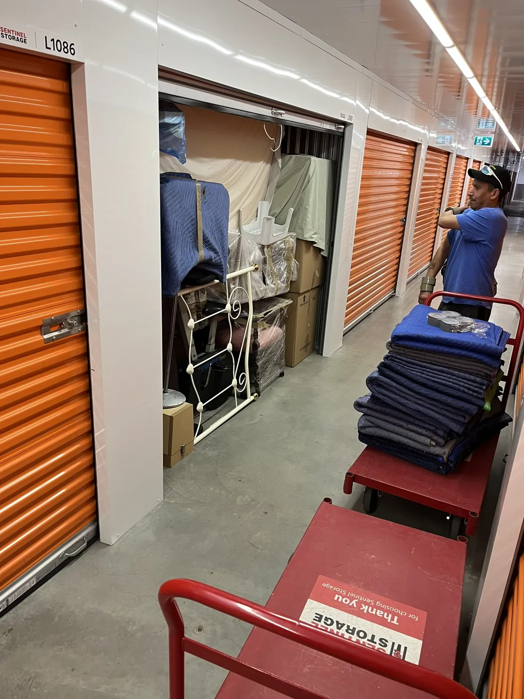 Moving equipment and furniture being handled at a storage facility