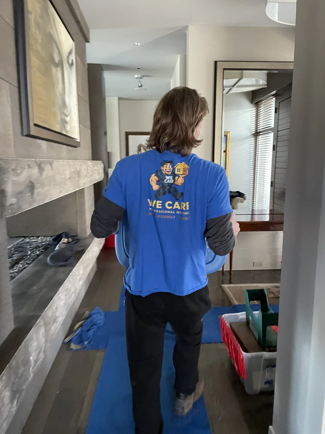 We Care team member working inside a customer’s home